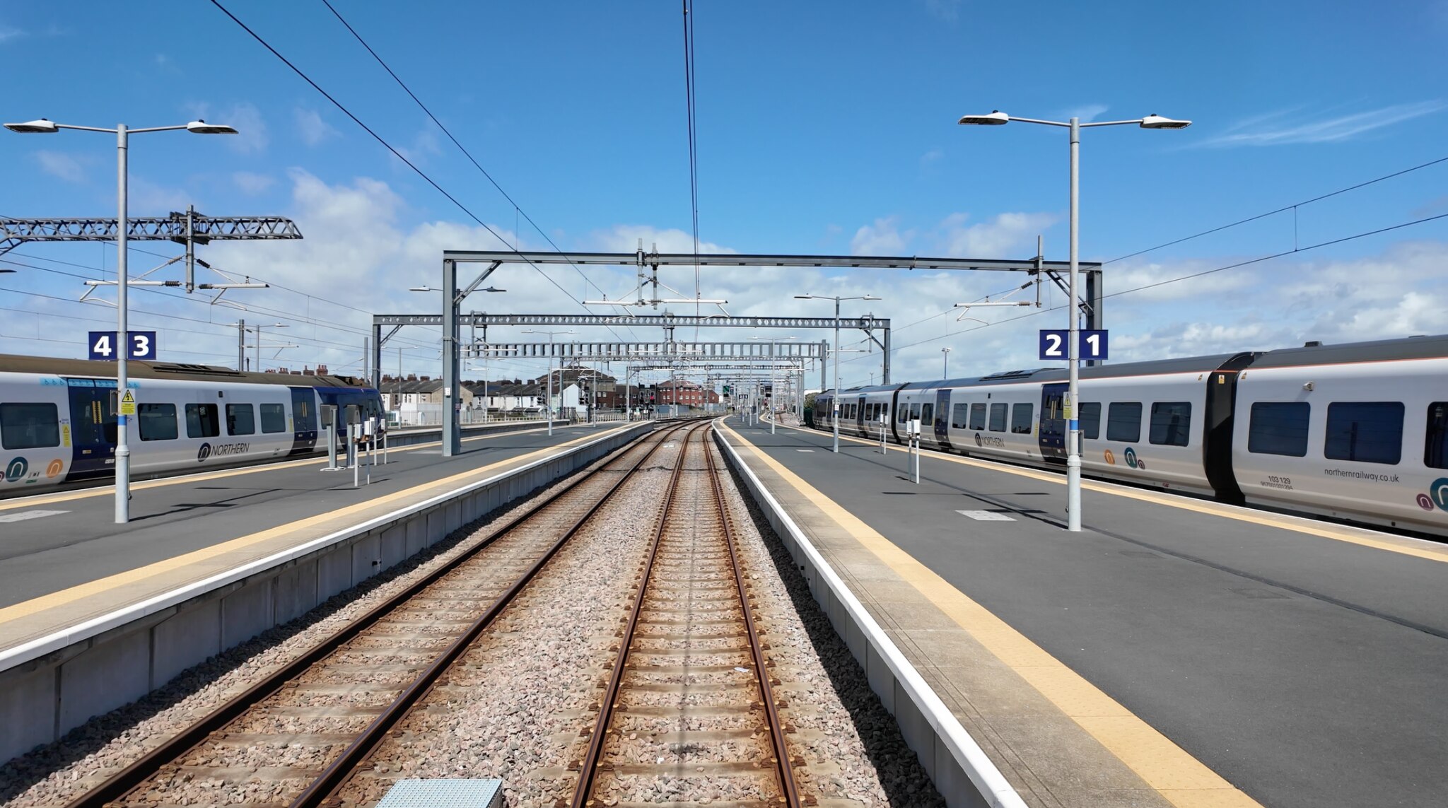 View along the tracks between the platforms at Blackpool North station